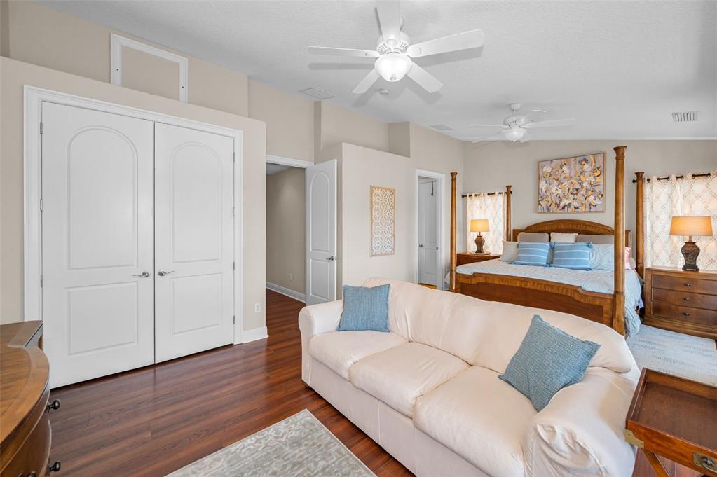 47 West Morgan Street Tarpon Springs, FL 34689 - Photo 39 of 64 a living room with furniture and a wooden floor