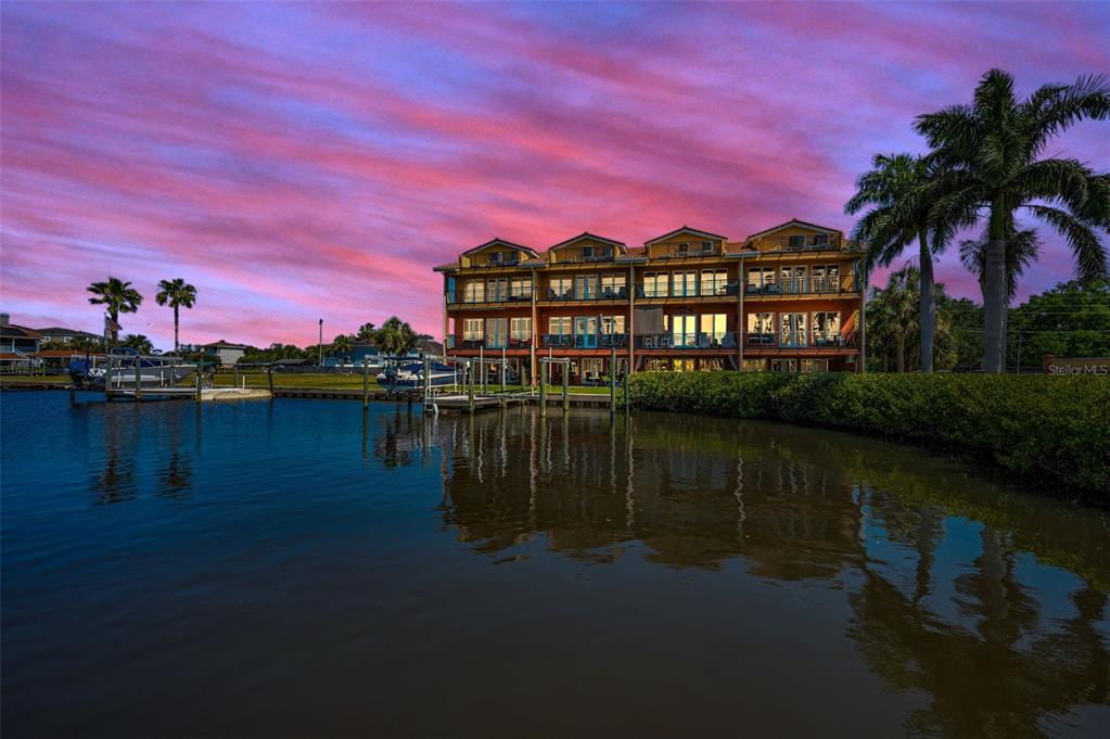 47 West Morgan Street Tarpon Springs, FL 34689 - Photo 6 of 64 a view of a lake with a building in the background