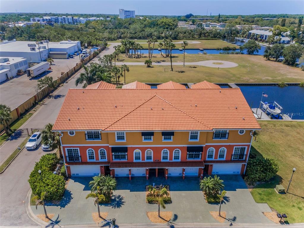 47 West Morgan Street Tarpon Springs, FL 34689 - Photo 64 of 64 an aerial view of a house with garden space and a patio