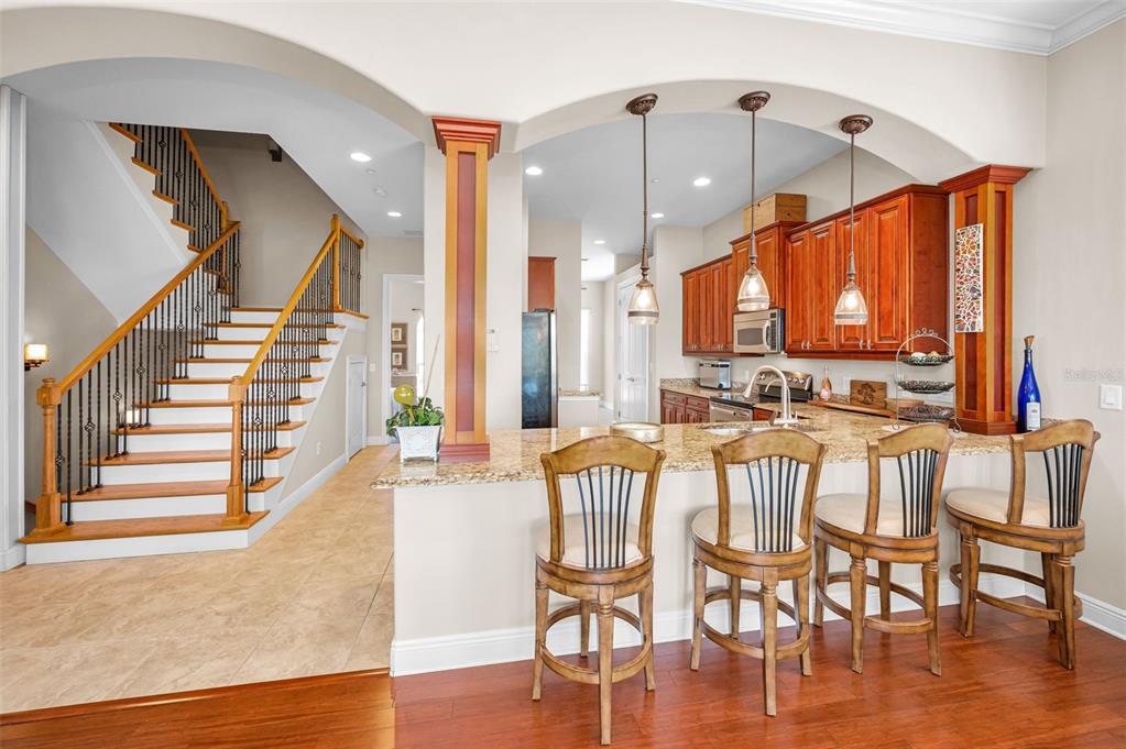 47 West Morgan Street Tarpon Springs, FL 34689 - Photo 10 of 64 a view of a dining room with furniture window and wooden floor