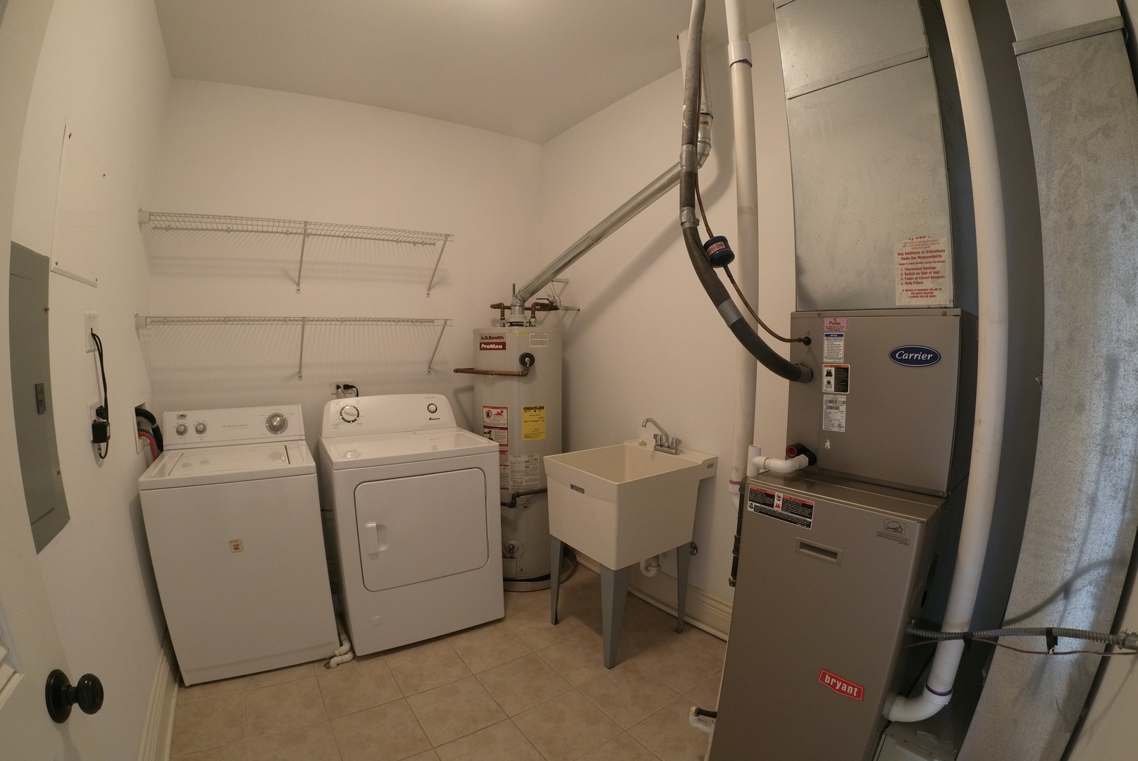 10765 Clock Tower Drive, Unit 602 Countryside, IL 60525 - Photo 12 of 21 a utility room with dryer and washer