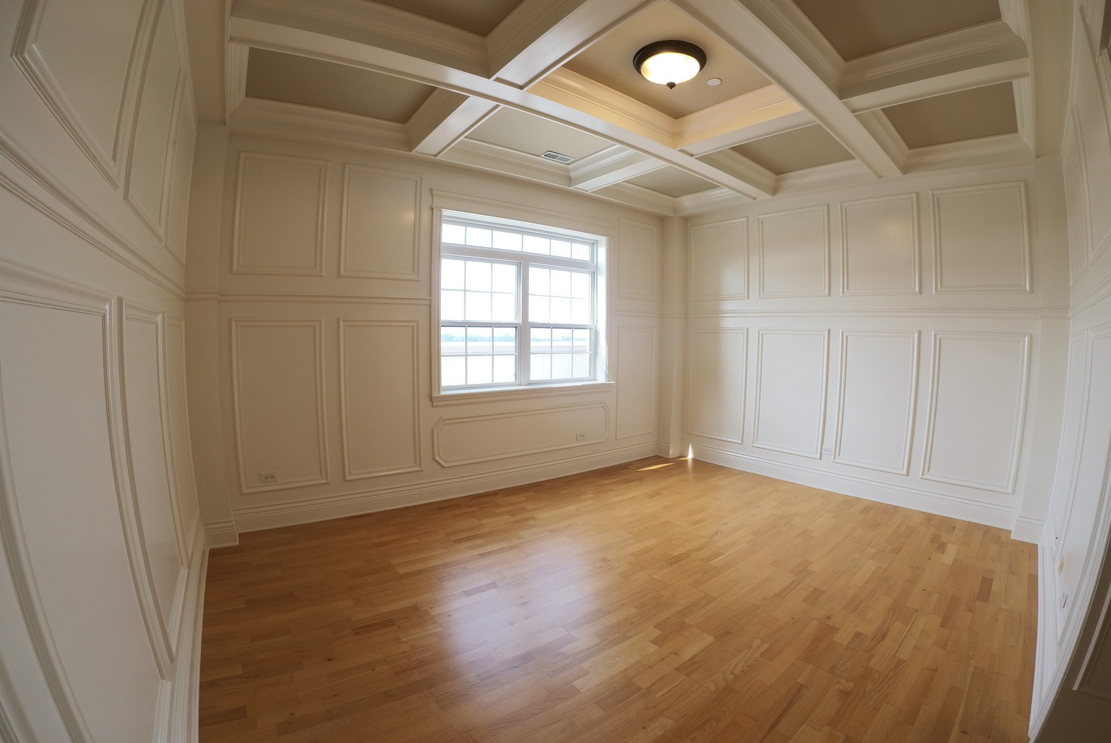 10765 Clock Tower Drive, Unit 602 Countryside, IL 60525 - Photo 13 of 21 an empty room with wooden floor and windows