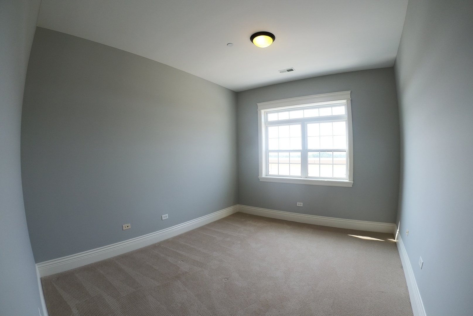 10765 Clock Tower Drive, Unit 602 Countryside, IL 60525 - Photo 17 of 21 an empty room with a window