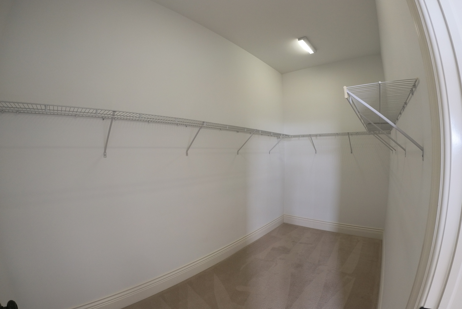 10765 Clock Tower Drive, Unit 602 Countryside, IL 60525 - Photo 18 of 21 a view of a room with racks on the wall