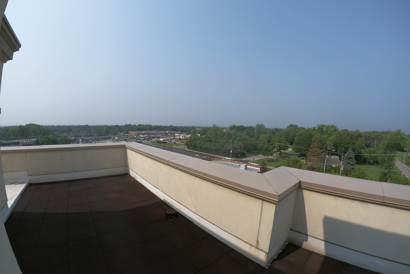 10765 Clock Tower Drive, Unit 602 Countryside, IL 60525 - Photo 19 of 21 a view of city and mountain from a balcony