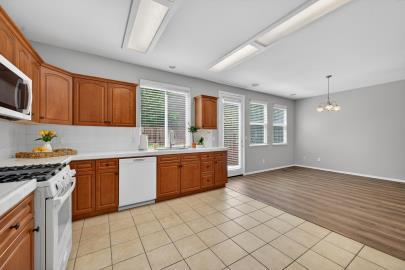 714 West Riviera Lane Clovis, CA 93619 - Photo 15 of 35 Large spacious kitchen with new gas range and dishwasher. Newer refrigerator stays on the property!