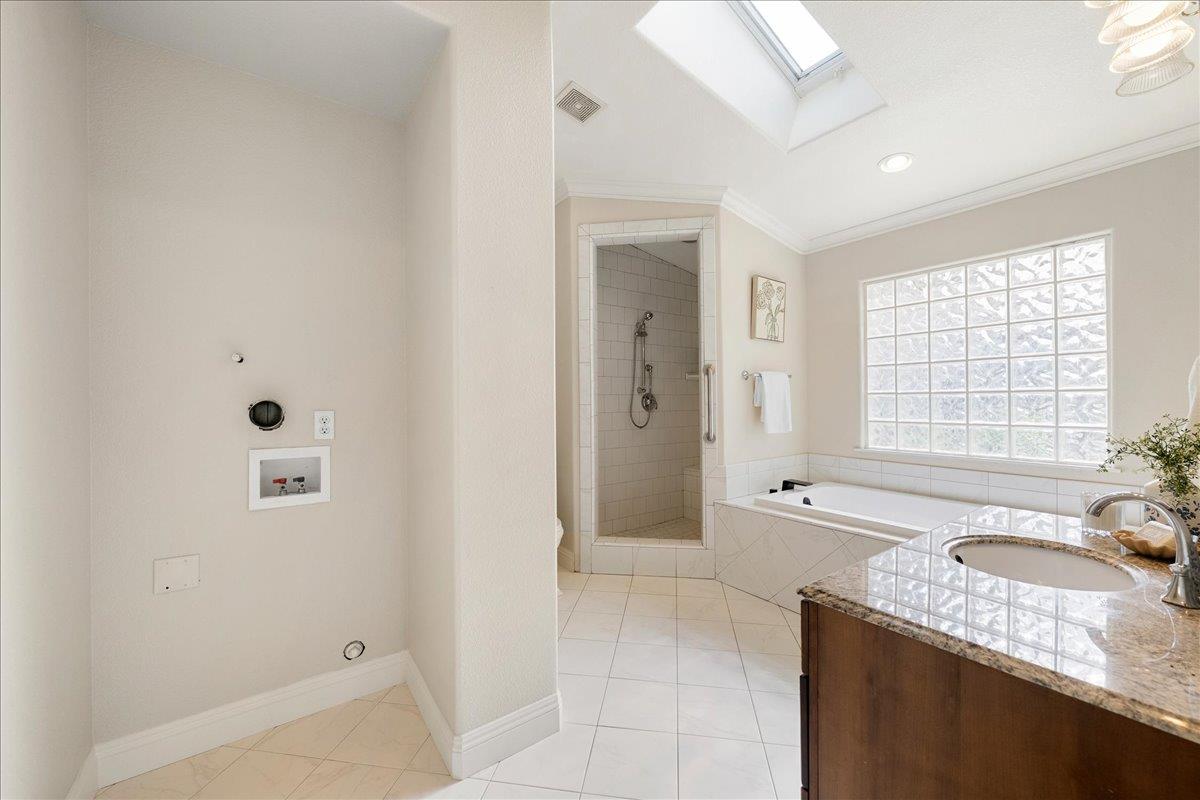 6817 Rappahannock Way Carmichael, CA 95608 - Photo 61 of 65 NANNY SUITE BATHROOM AND LAUNDRY