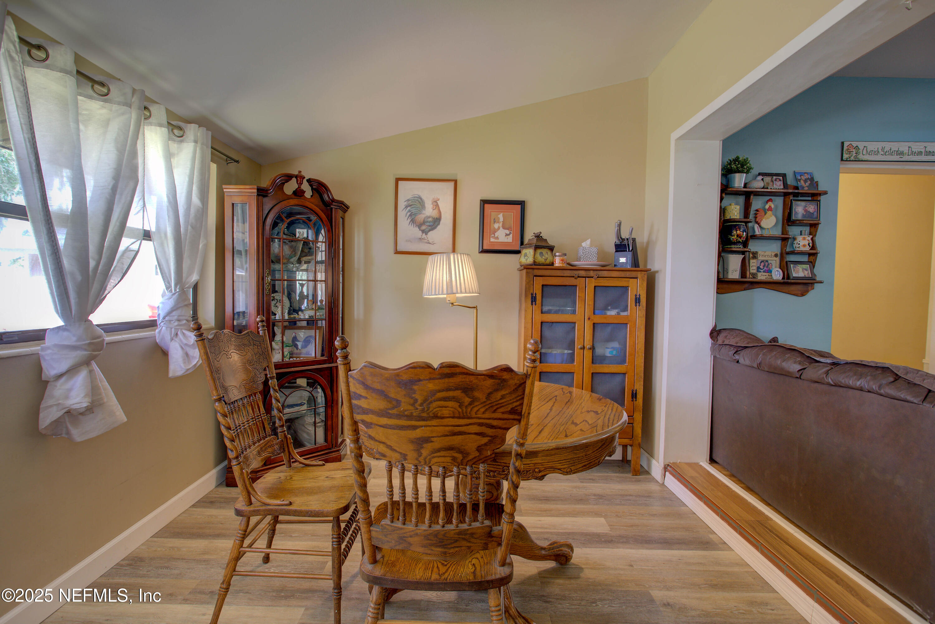 7861 State Road 21 Keystone Heights, FL 32656 - Photo 14 of 51 a view of a livingroom with furniture and window