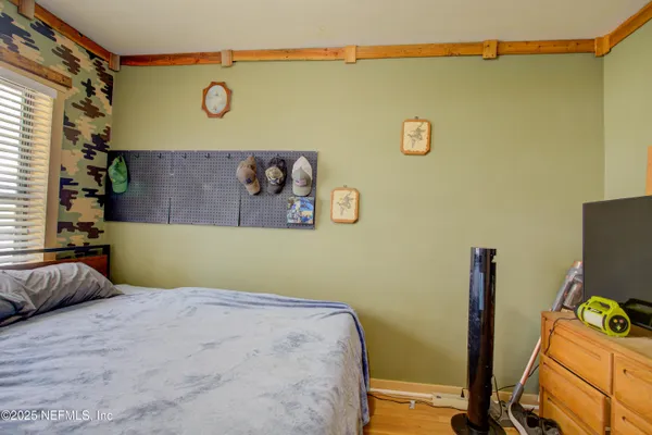 an aerial view of ocean and residential houses with outdoor space and lake view