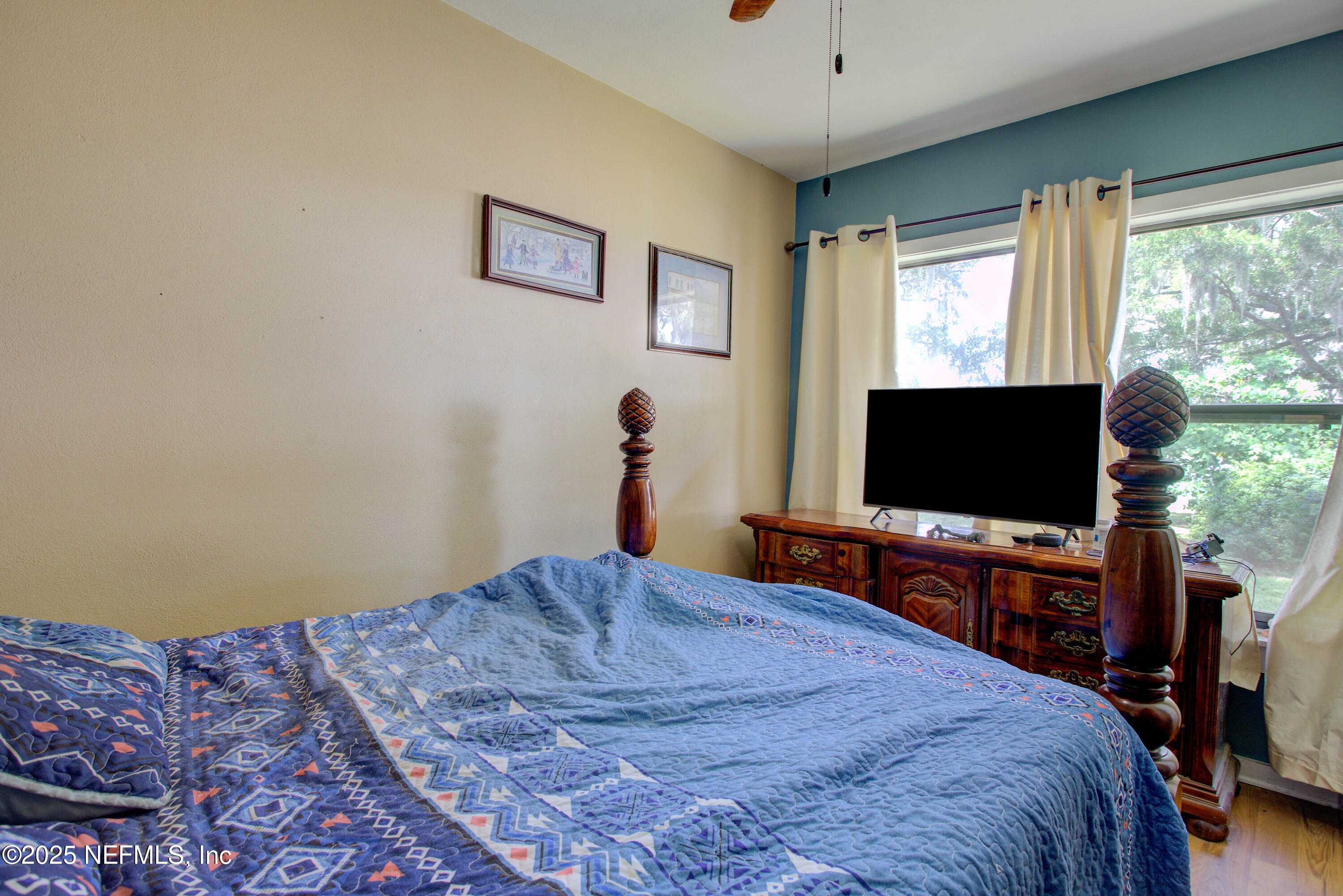 7861 State Road 21 Keystone Heights, FL 32656 - Photo 31 of 51 a bedroom with bed and a flat screen tv