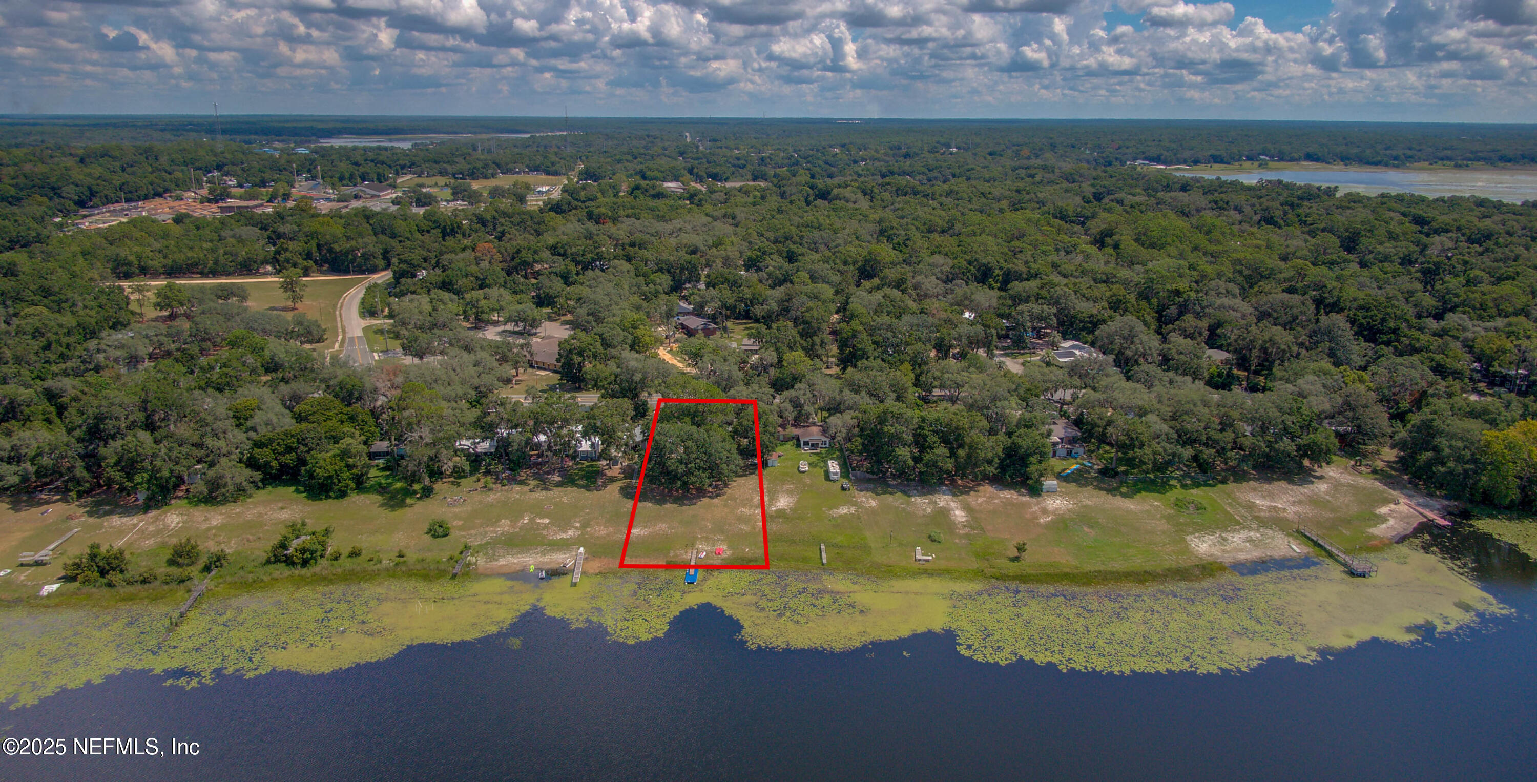 7861 State Road 21 Keystone Heights, FL 32656 - Photo 34 of 51 a view of a lake with a yard