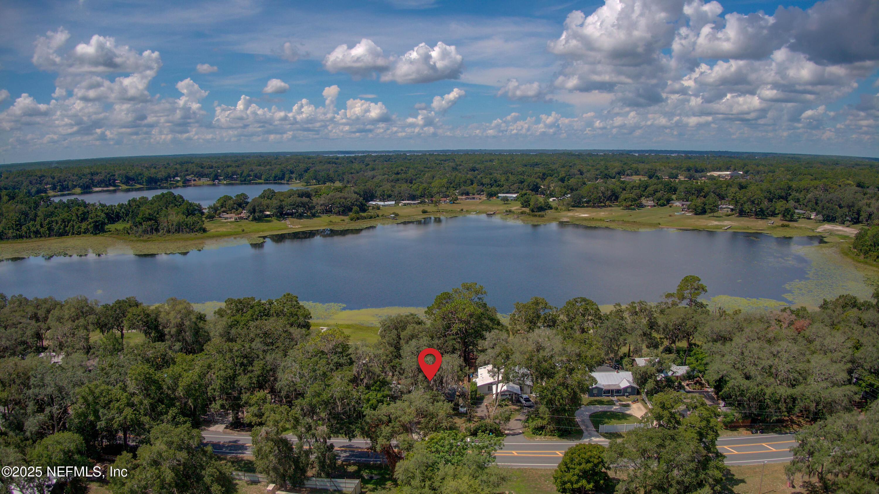 7861 State Road 21 Keystone Heights, FL 32656 - Photo 48 of 51 an aerial view of lake and residential houses with outdoor space