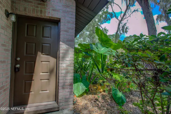 a view of a livingroom with furniture and window