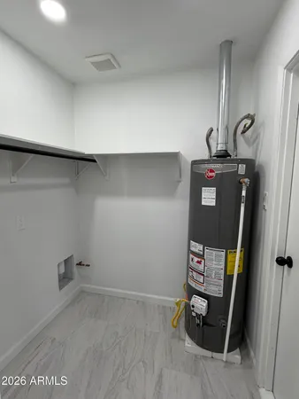 a room with storage and utility