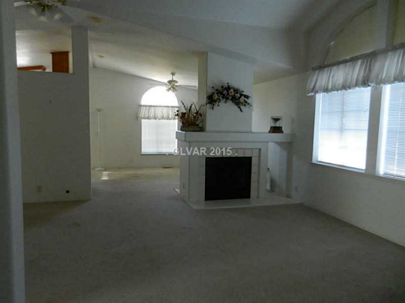 2460 Mesquite Ranch Road Pahrump, NV 89060 - Photo 9 of 11 Property Photo. Living Room and Fireplace view