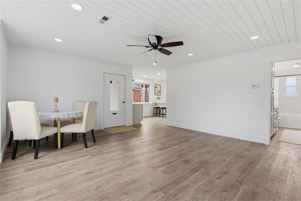 1006 Edgewood Road New Kensington, PA 15068 - Photo 16 of 47 a view of a livingroom with furniture and a ceiling fan