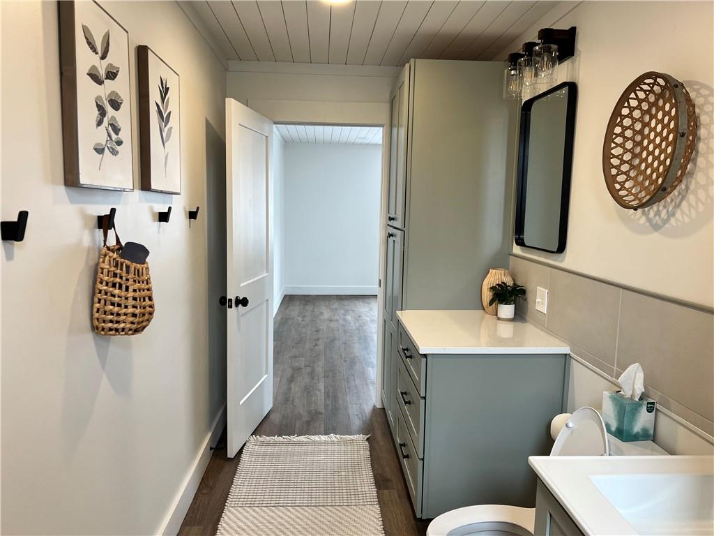 1006 Edgewood Road New Kensington, PA 15068 - Photo 19 of 47 a bathroom with a sink toilet and mirror