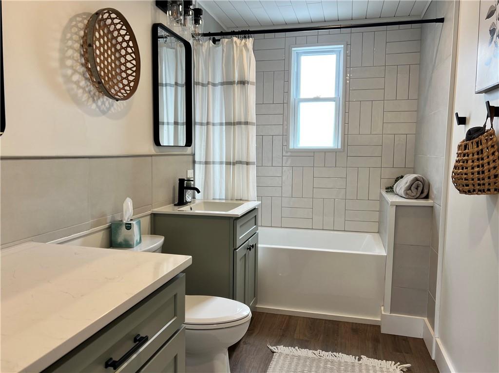 1006 Edgewood Road New Kensington, PA 15068 - Photo 20 of 47 a bathroom with a sink a toilet and shower