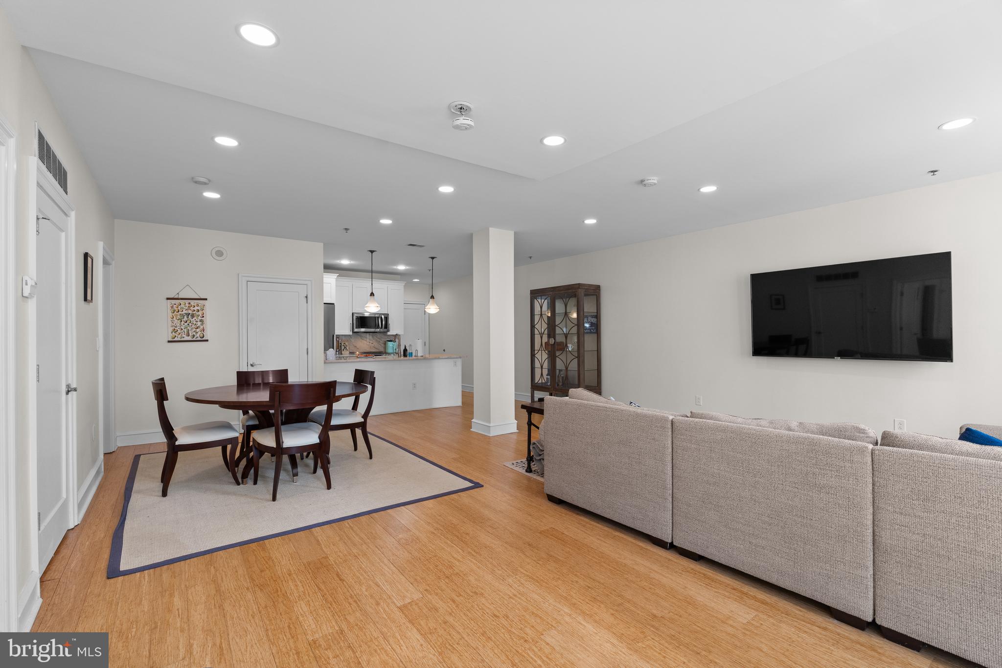 1811 Chestnut Street, Unit 501 Philadelphia, PA 19103 - Photo 6 of 26 a living room with furniture and a flat screen tv