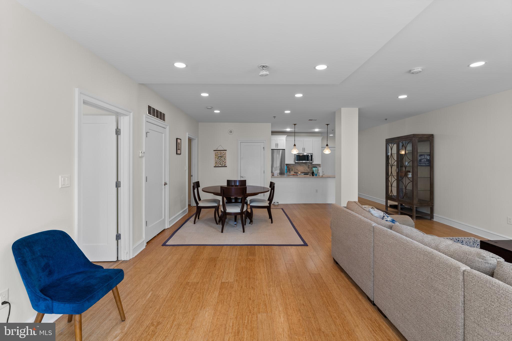 1811 Chestnut Street, Unit 501 Philadelphia, PA 19103 - Photo 7 of 26 a view of a room with furniture and wooden floor