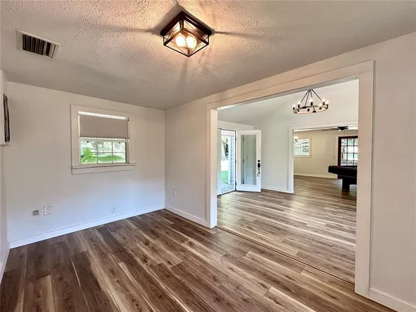 a bathroom with a double vanity sink and mirror