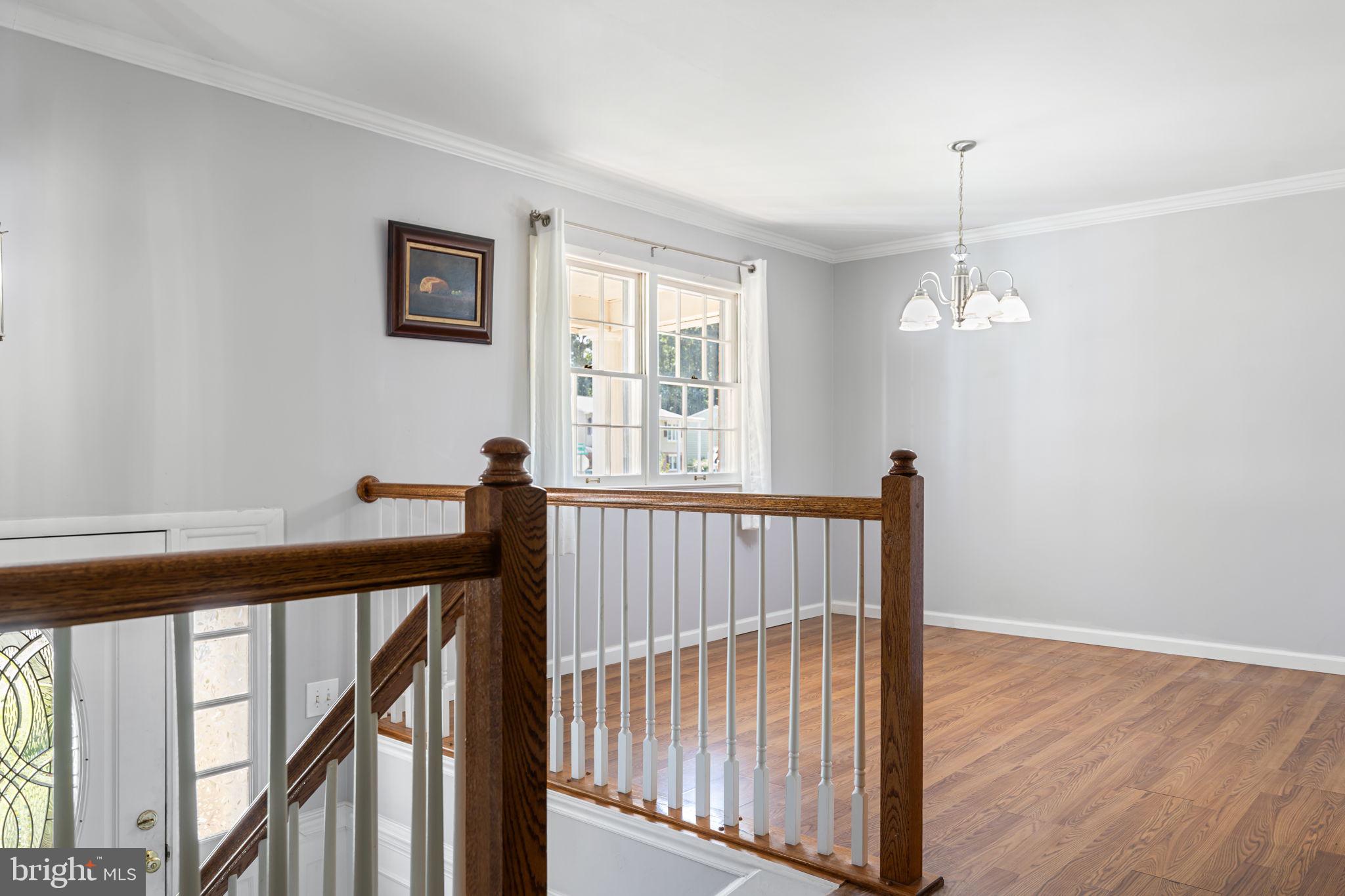 13532 Delaney Road Woodbridge, VA 22193 - Photo 3 of 30 Entryway Stairs & View of Dining Room