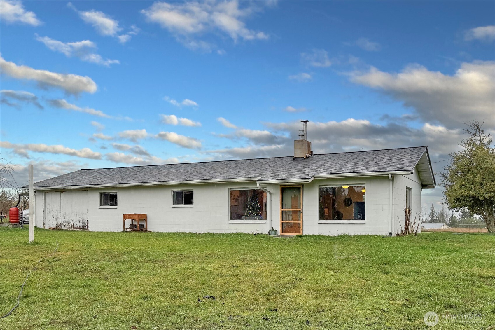 163 Cliff Robinson Lane Sequim, WA 98382 - Photo 29 of 40 a view of a house with a backyard