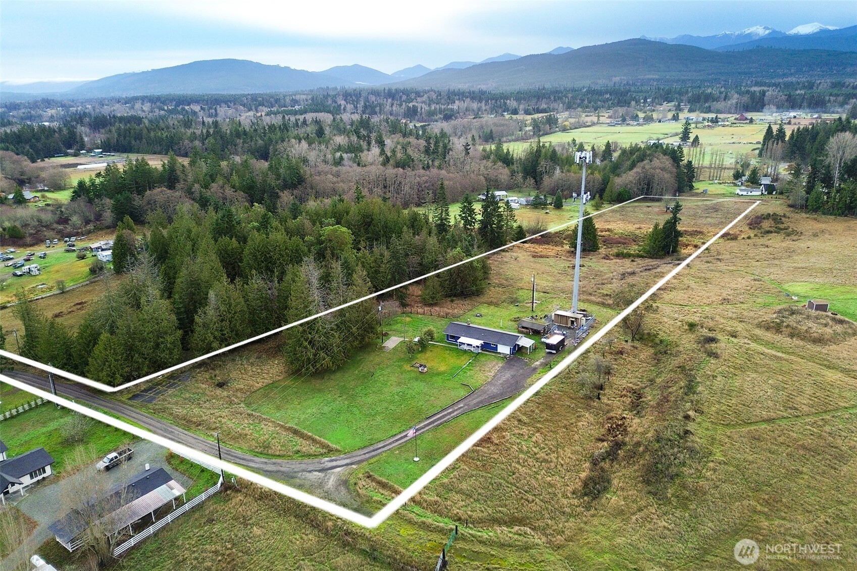 163 Cliff Robinson Lane Sequim, WA 98382 - Photo 39 of 40 a view of a pool with a balcony