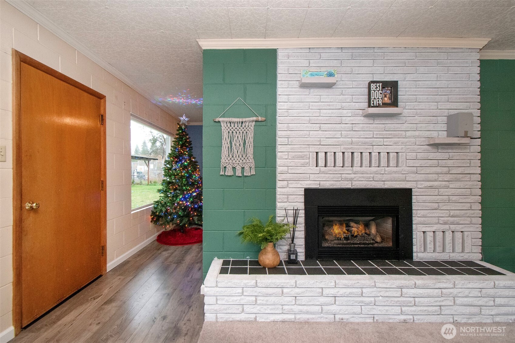 163 Cliff Robinson Lane Sequim, WA 98382 - Photo 8 of 40 a view of an empty room with a fireplace