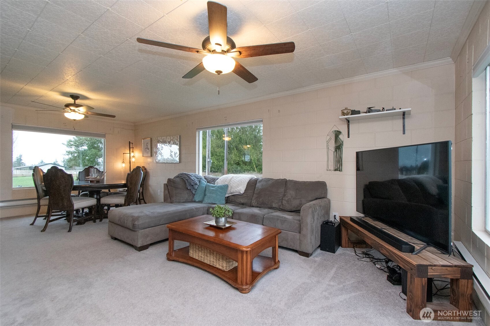 163 Cliff Robinson Lane Sequim, WA 98382 - Photo 9 of 40 a living room with furniture and a flat screen tv