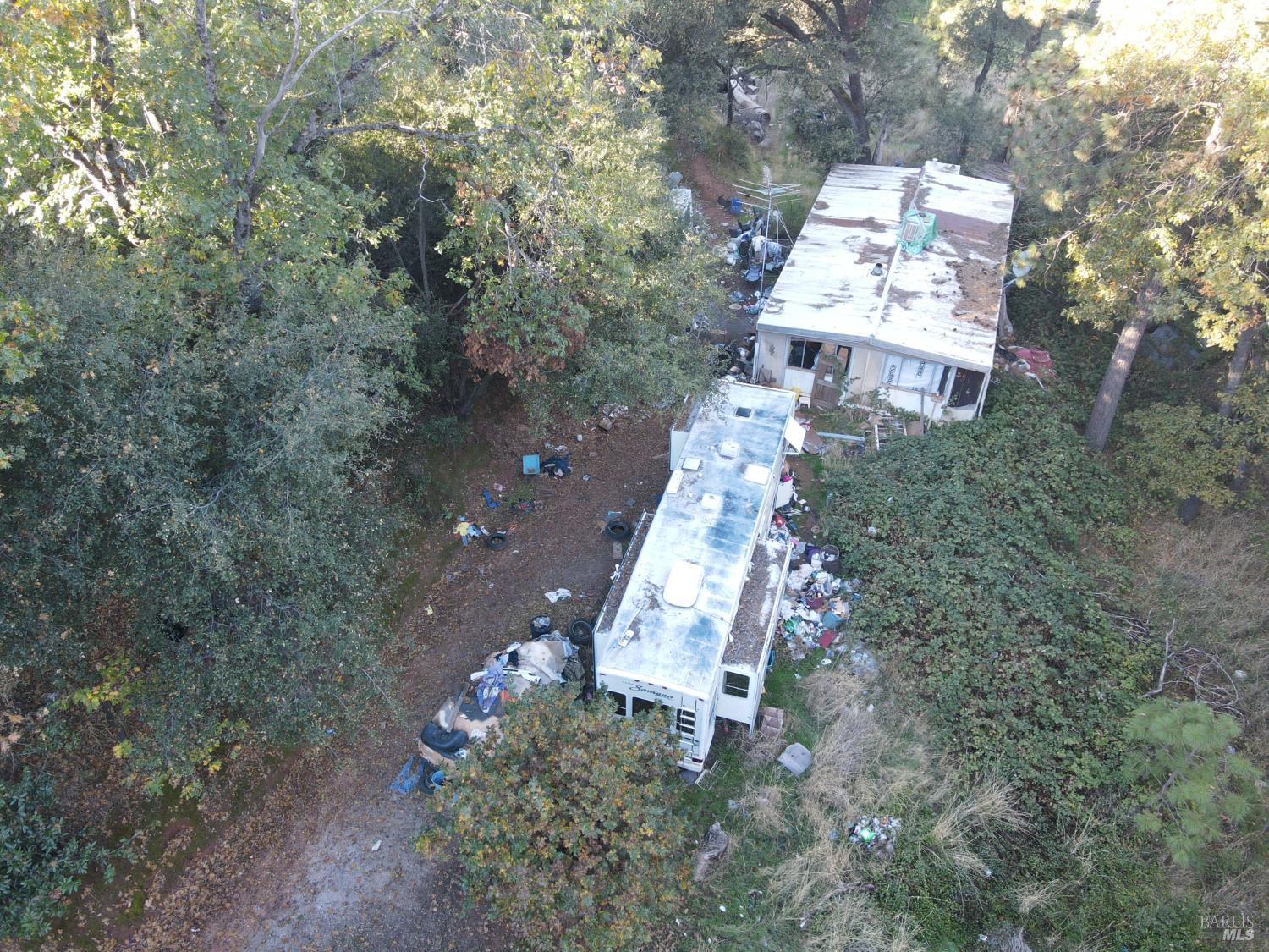 22666 Quail Mine Road Sonora, CA 95370 - Photo 2 of 10 an aerial view of a house with a yard