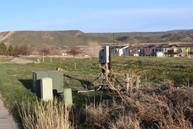 a view of a lake with mountains in front of it