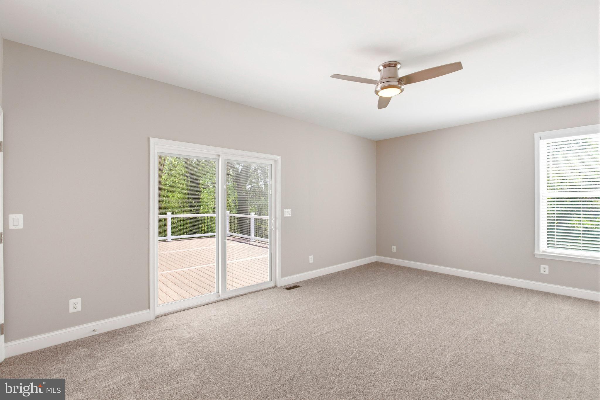 24524 Ruff Ruff Lane Hollywood, MD 20636 - Photo 12 of 41 Main Level Master Bedroom with Deck access