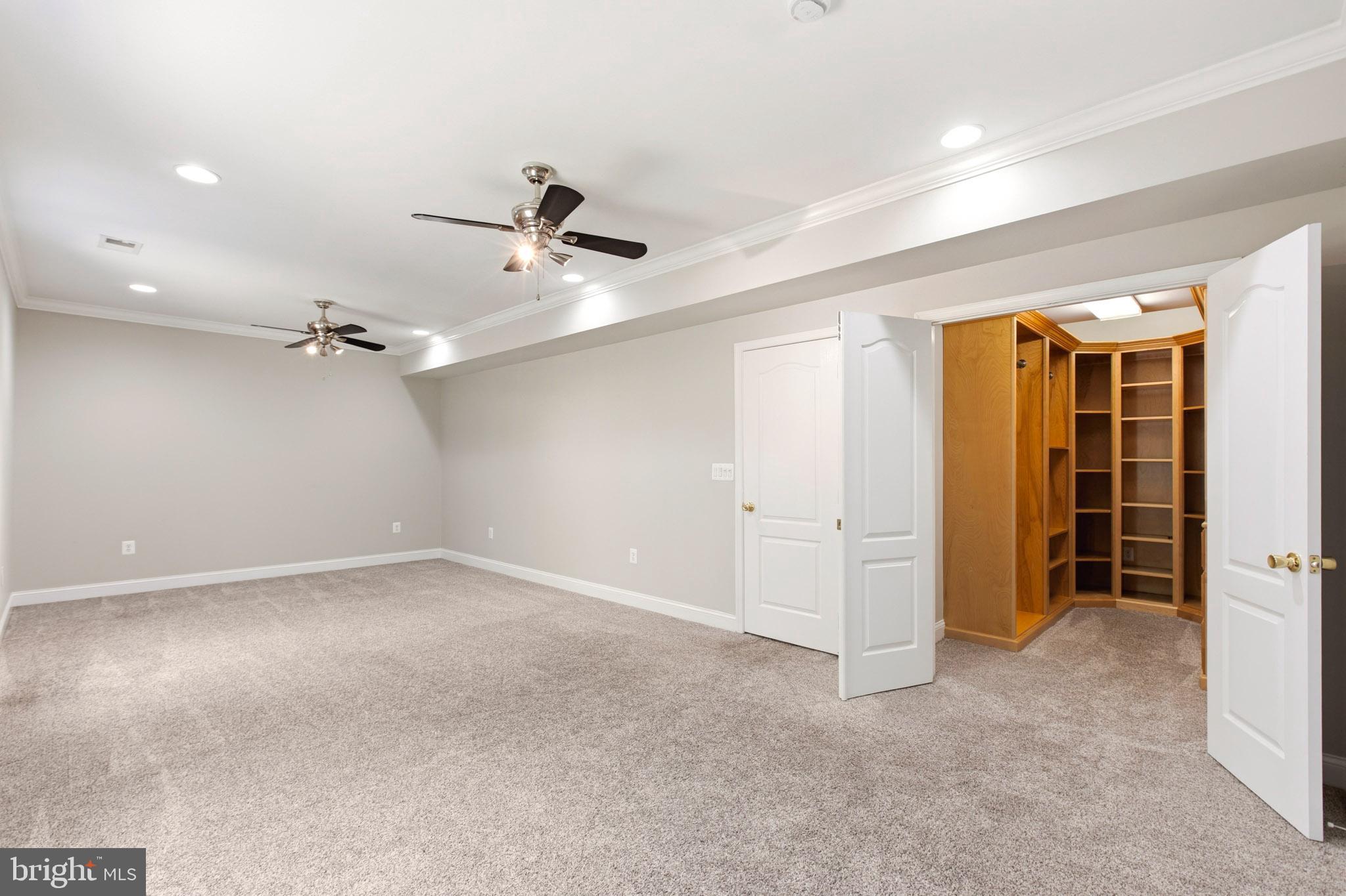 24524 Ruff Ruff Lane Hollywood, MD 20636 - Photo 26 of 41 Downstairs Master Bedroom with Walk-In Closet