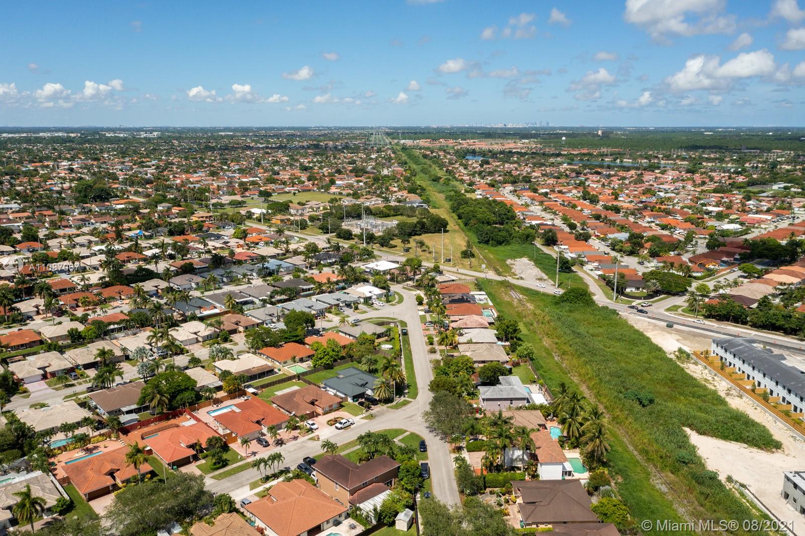 18017 Southwest 148th Ave Road Miami, FL 33187 - Photo 24 of 27 an aerial view of a city