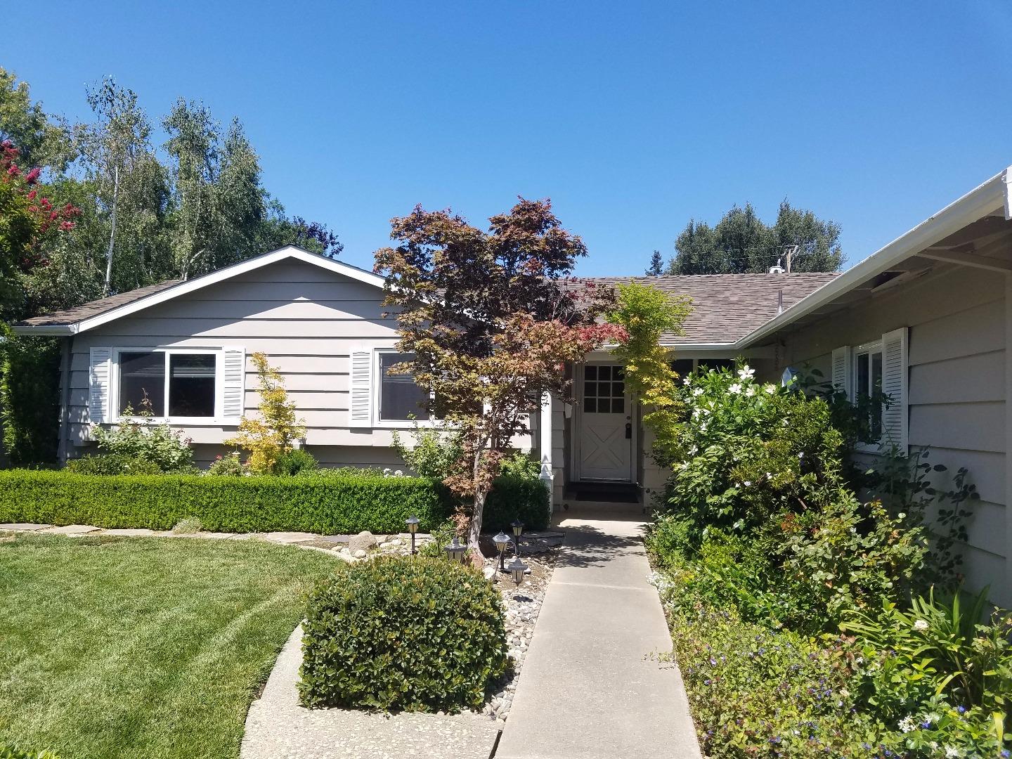 1451 Lewiston Drive Sunnyvale, CA 94087 - Photo 1 of 15 a front view of a house with a yard