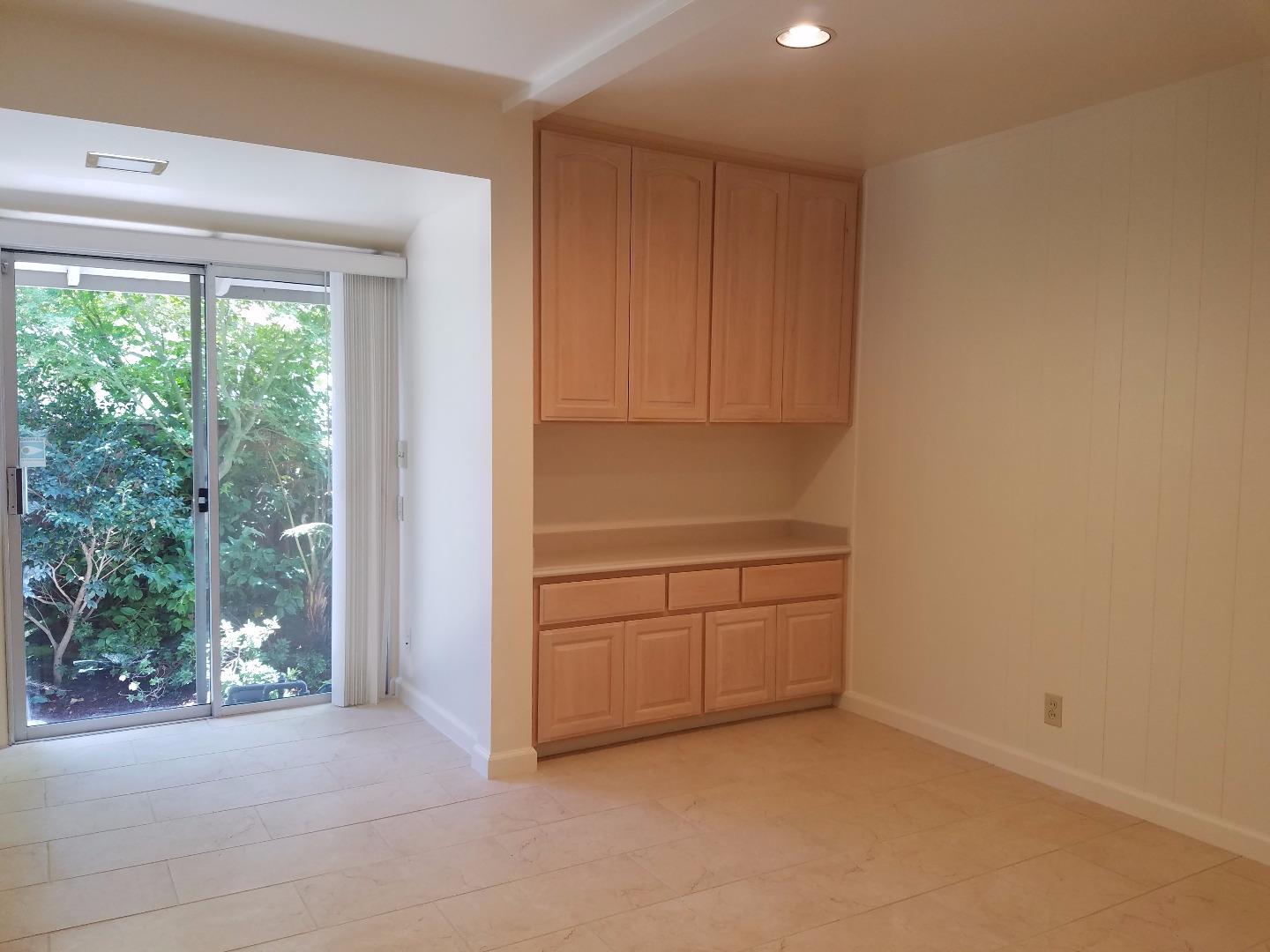 1451 Lewiston Drive Sunnyvale, CA 94087 - Photo 13 of 15 a room with a cabinet and a window