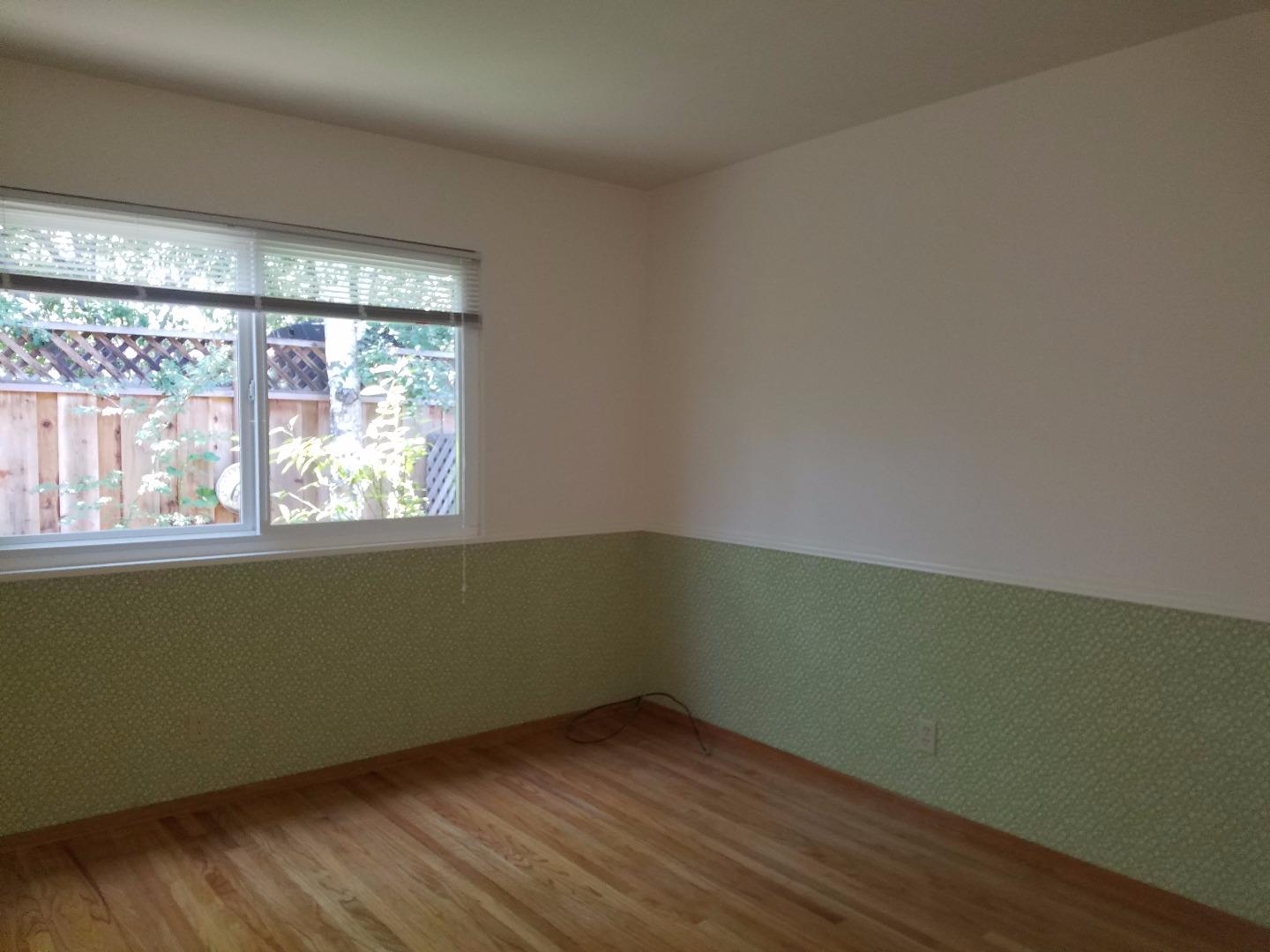 1451 Lewiston Drive Sunnyvale, CA 94087 - Photo 5 of 15 a view of a room with wooden floor and a window
