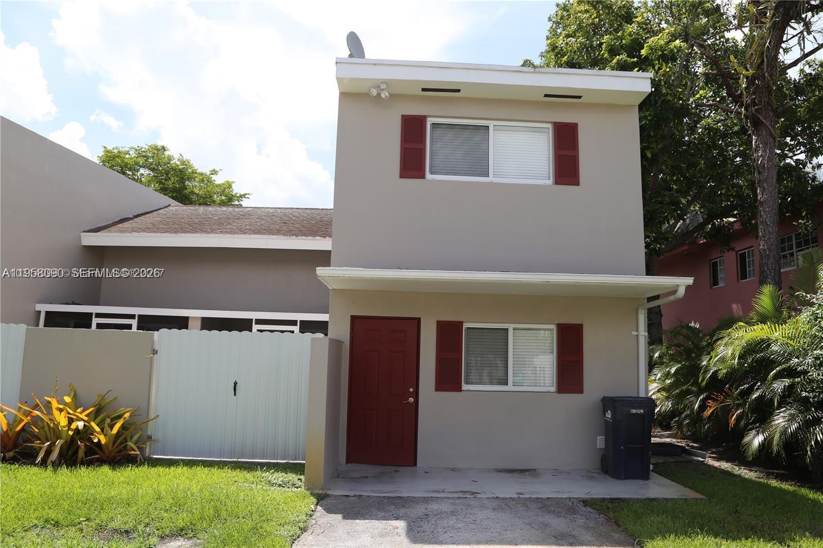 8940 Southwest 95th Avenue Miami, FL 33176 - Photo 21 of 21 a view of a house with a yard
