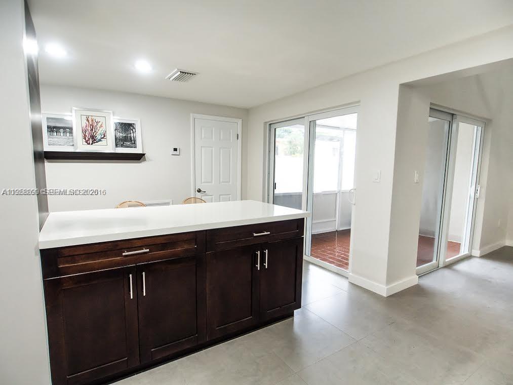 8940 Southwest 95th Avenue Miami, FL 33176 - Photo 7 of 21 a bathroom with a sink and a mirror