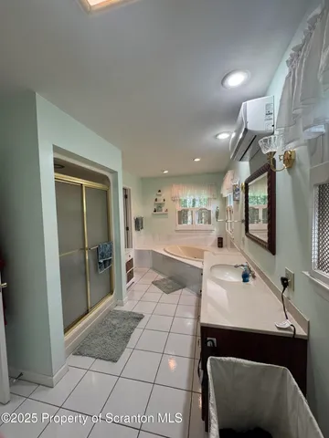 a lobby with furniture and mirror