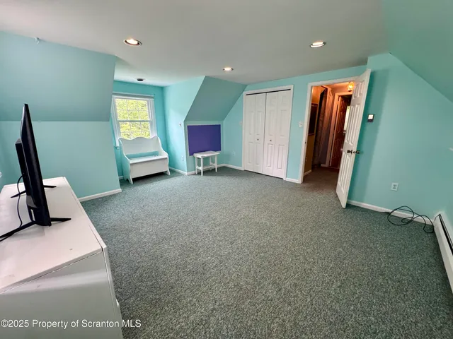 a room with furniture and a window