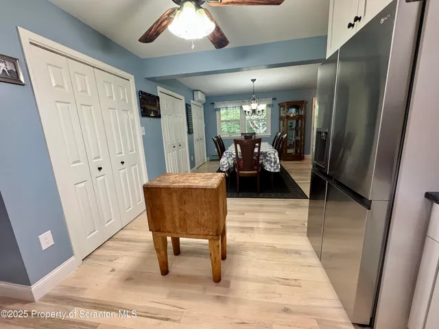 a lobby with furniture and a rug
