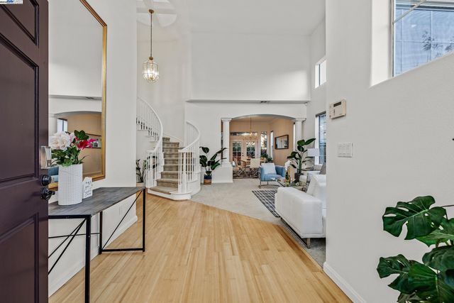 a view of a living room and dining room