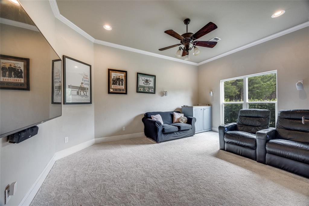 1462 Durham Road Whitewright, TX 75491 - Photo 20 of 40 a living room with furniture ceiling fan and a window
