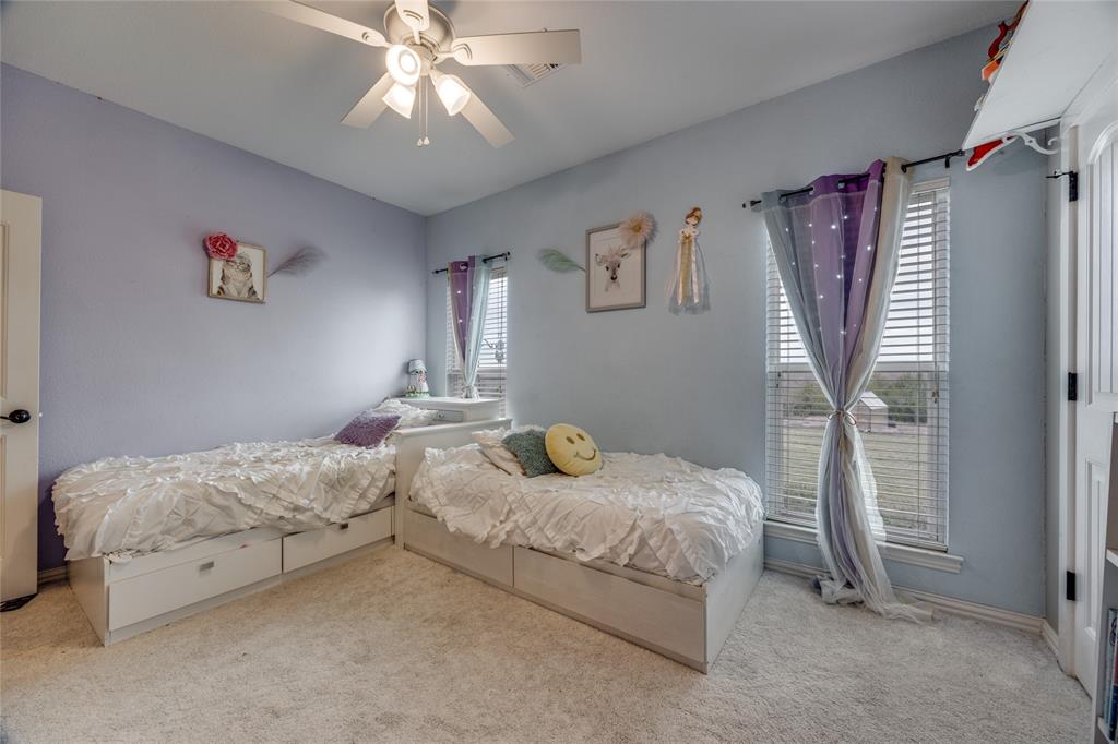 1462 Durham Road Whitewright, TX 75491 - Photo 26 of 40 a bedroom with bed and window