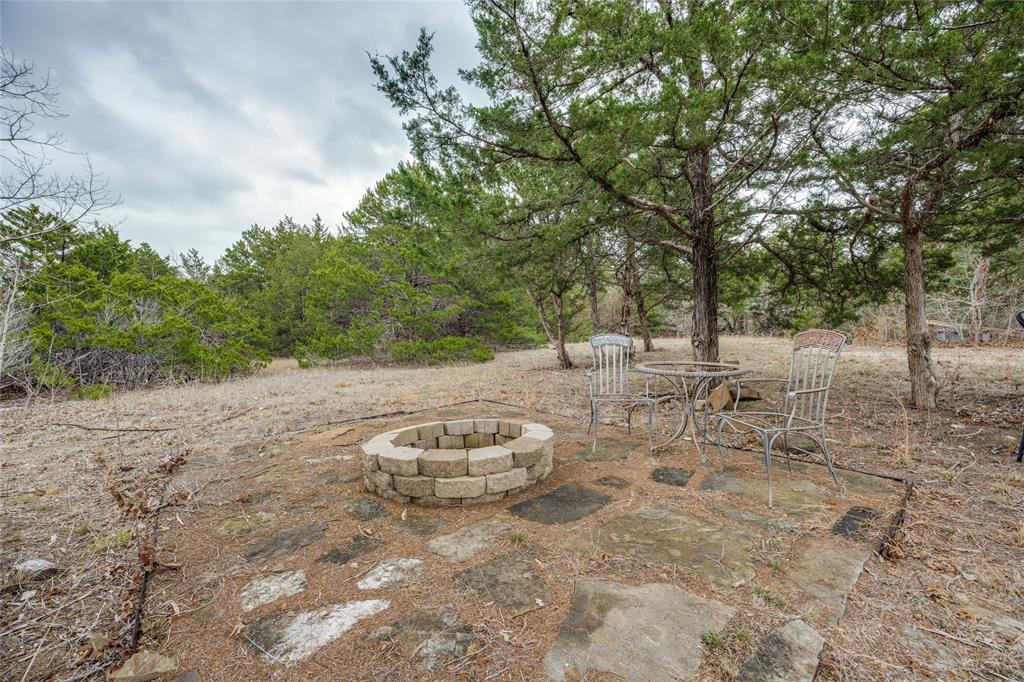 1462 Durham Road Whitewright, TX 75491 - Photo 35 of 40 a view of a backyard of a house