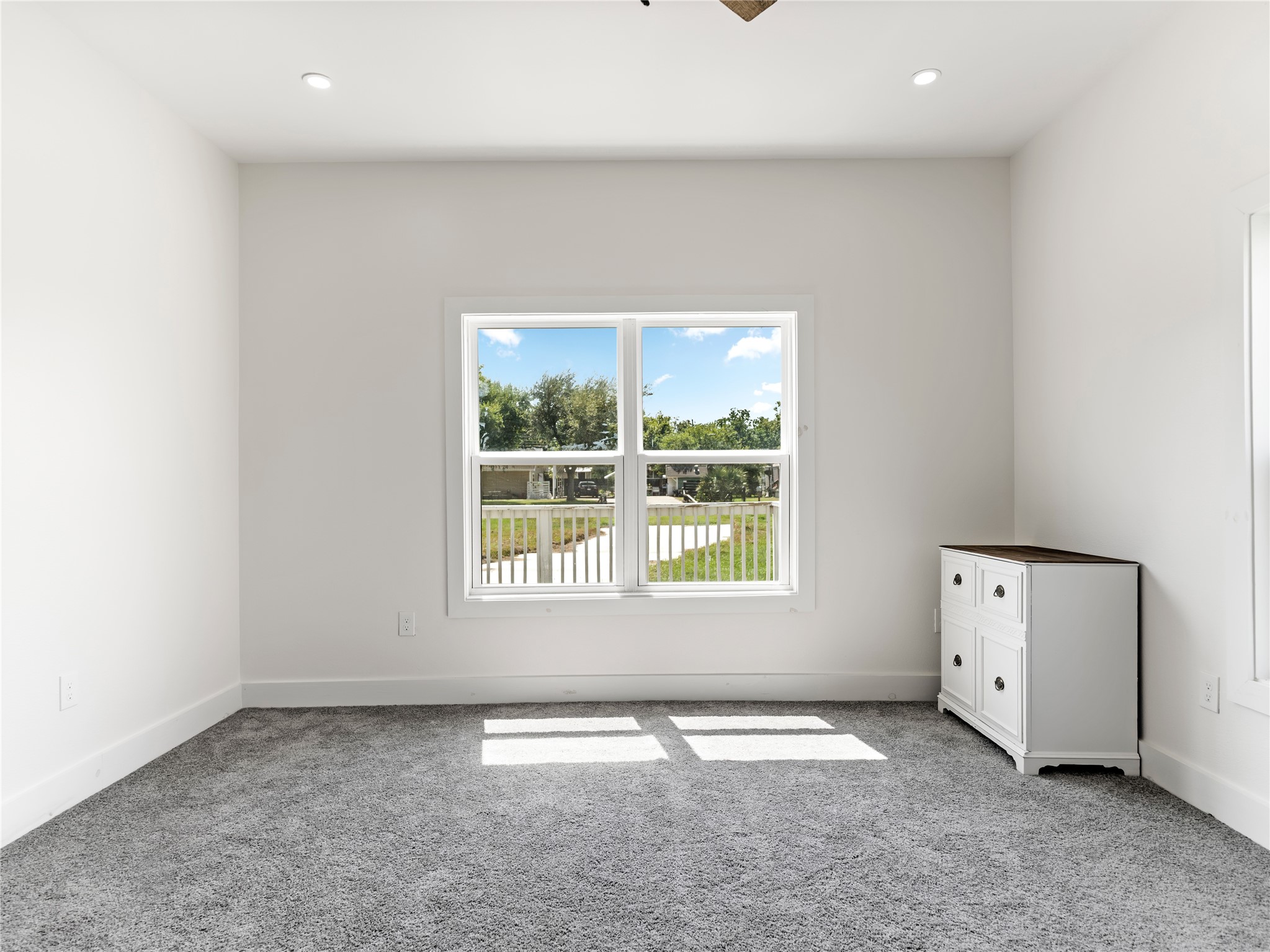 1014 Humphrey Street Palacios, TX 77465 - Photo 11 of 26 an empty room with a window