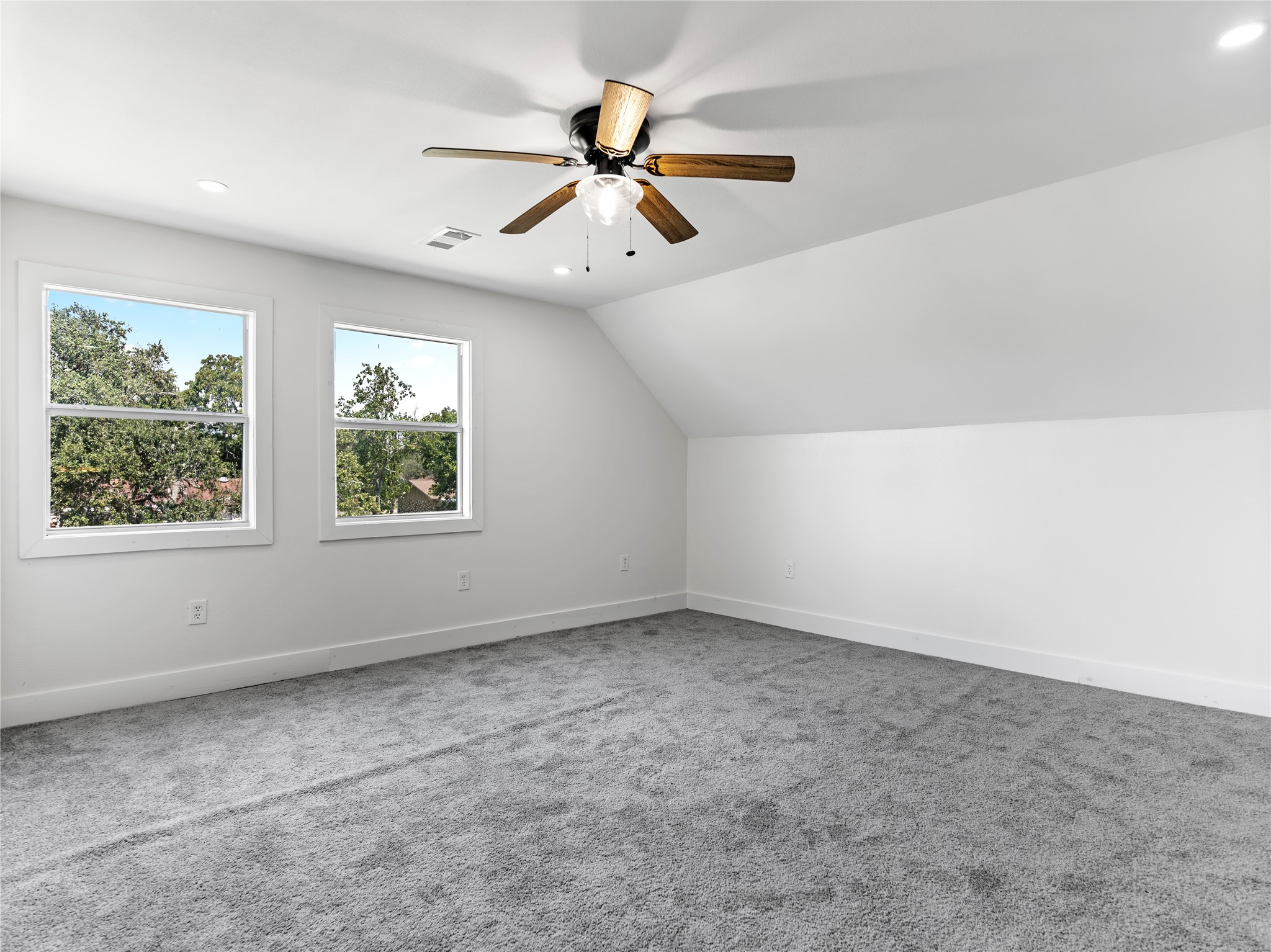 1014 Humphrey Street Palacios, TX 77465 - Photo 6 of 26 an empty room with a window