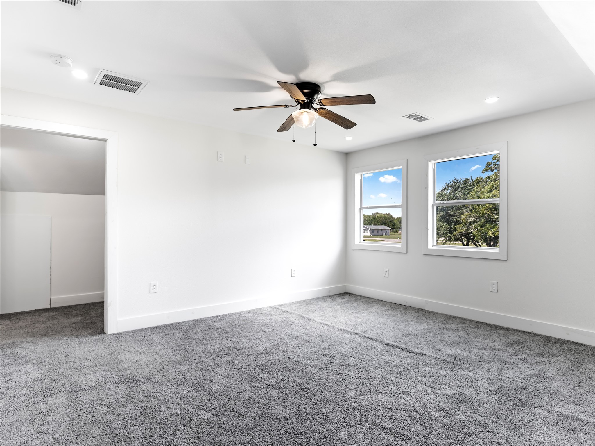 1014 Humphrey Street Palacios, TX 77465 - Photo 7 of 26 a view of an empty room with a window